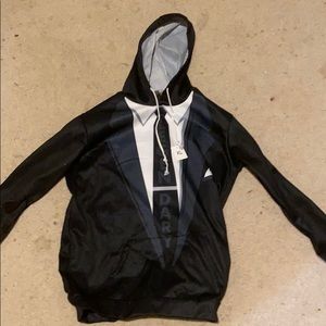 This is a sweat shirt with a design like a tuxedo